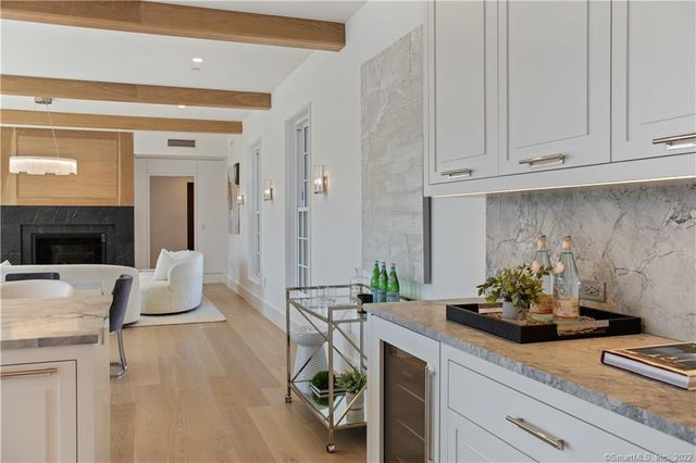a kitchen with a table and chairs in it