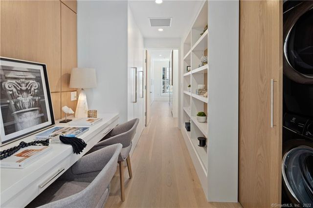 a room with furniture and a flat screen tv