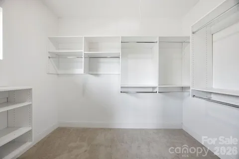 a view of an empty walk in closet