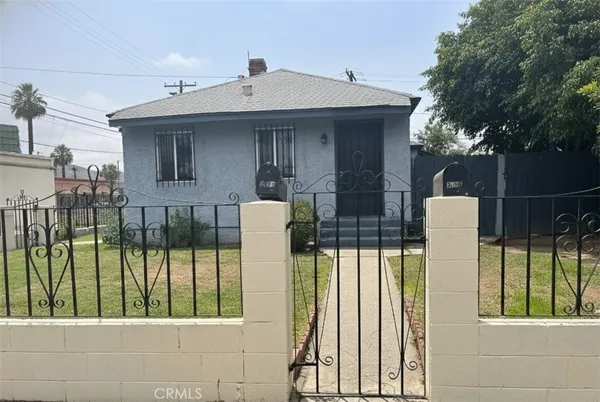 a front view of a house with a porch