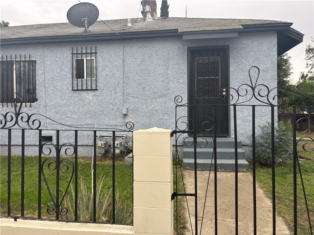 3850 Dwight Avenue Riverside, CA 92507 - Photo 5 of 7 a front view of a house with plants