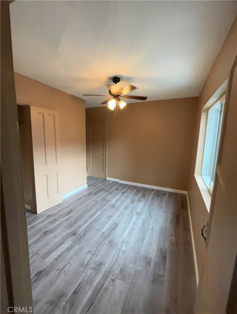 3850 Dwight Avenue Riverside, CA 92507 - Photo 6 of 7 a view of a livingroom with wooden floor