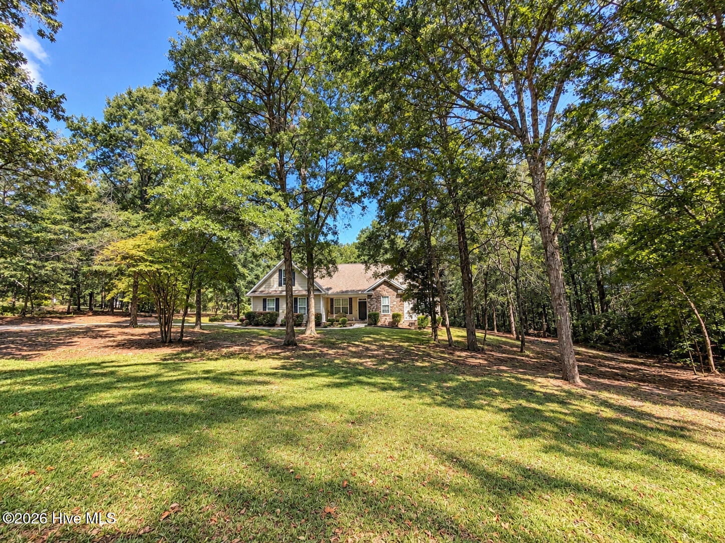 Outside, the wooded 2.1 acreage lot creates a private, natural backdrop with plenty of room to enjoy the outdoors.