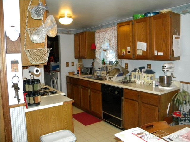 13219 Tibbets Road Memphis, MI 48041 - Photo 2 of 21 This is a view of the kitchen.
