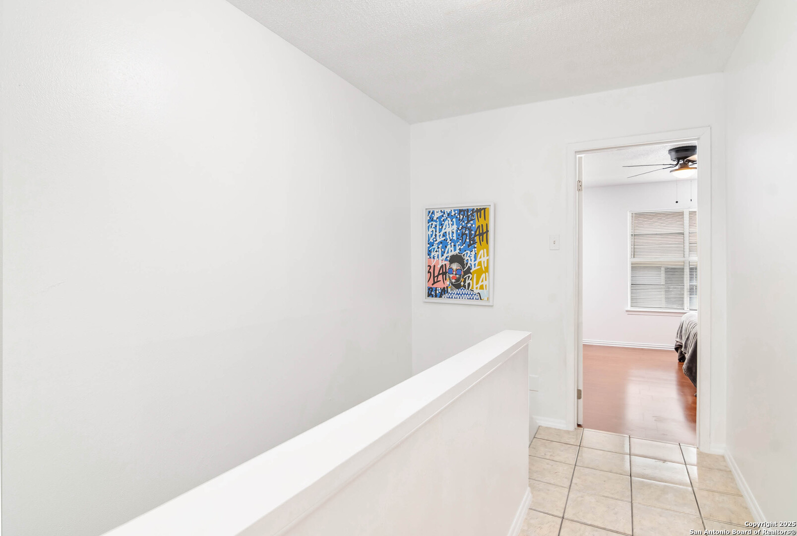 911 Vance Jackson Road, Unit A San Antonio, TX 78201 - Photo 14 of 20 a view of hallway with painting and stairs