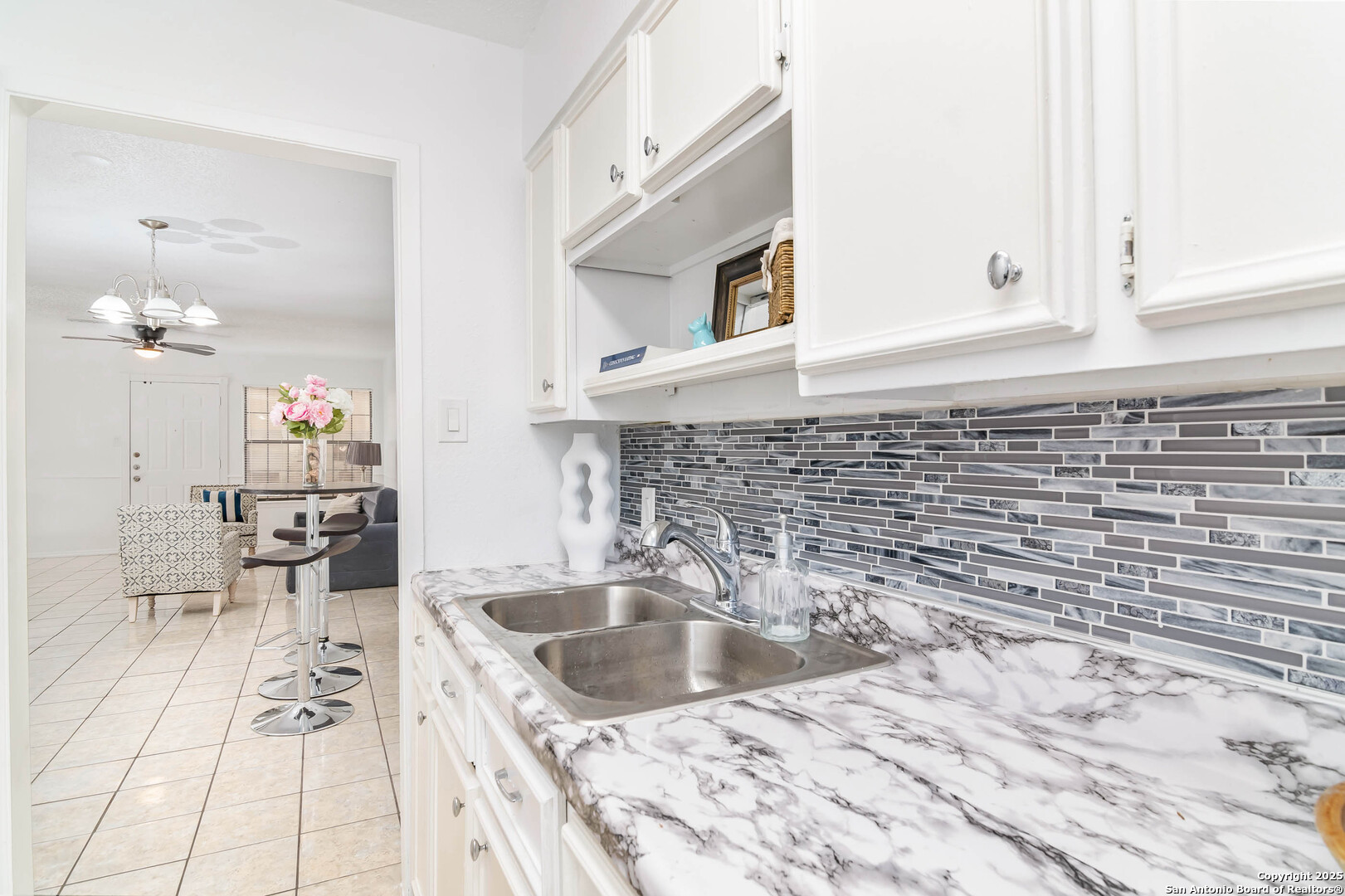 911 Vance Jackson Road, Unit A San Antonio, TX 78201 - Photo 8 of 20 a kitchen with a sink a stove and cabinets