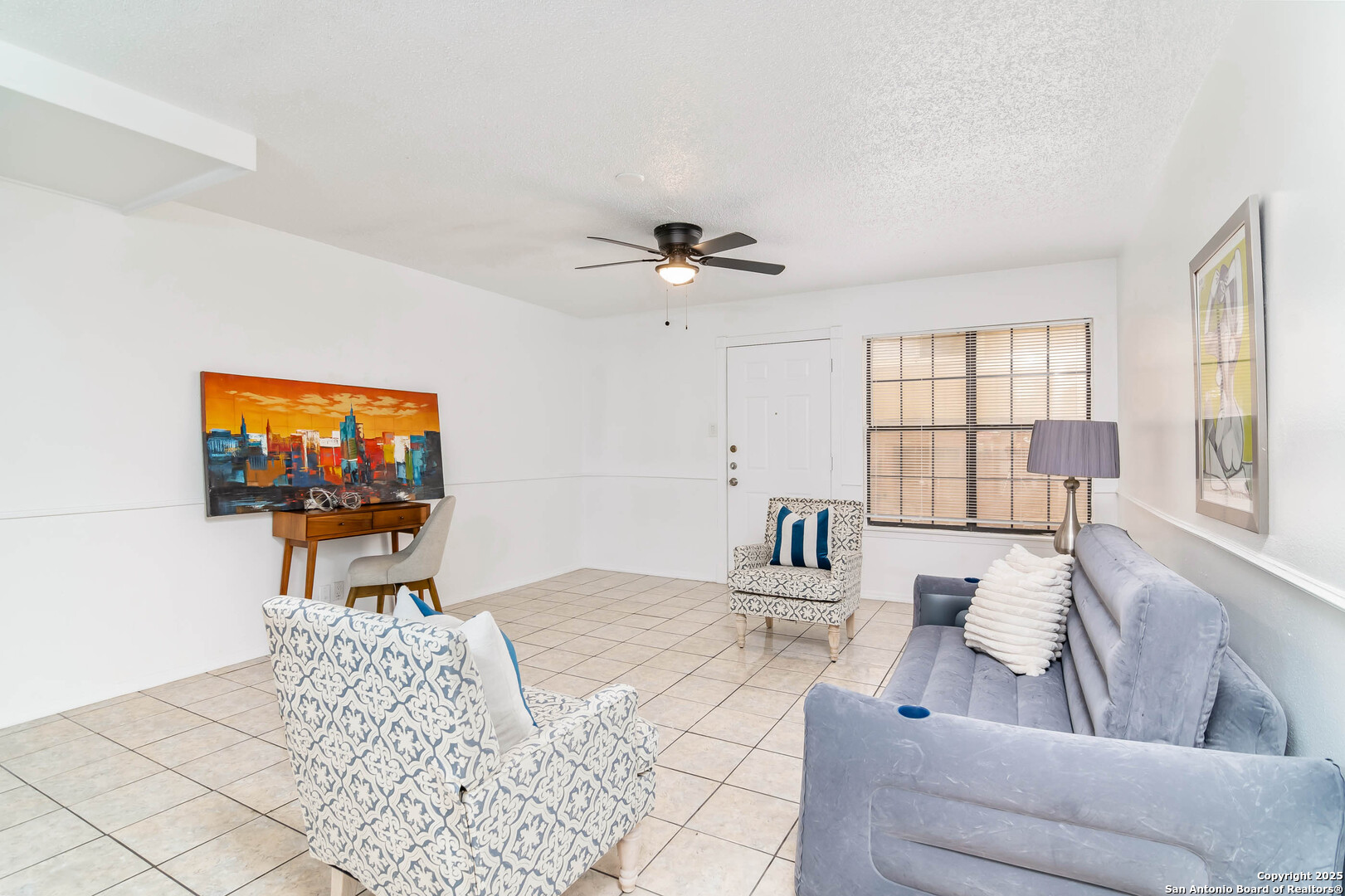 911 Vance Jackson Road, Unit A San Antonio, TX 78201 - Photo 10 of 20 a living room with furniture and a flat screen tv