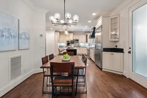 a kitchen with granite countertop a stove and a sink