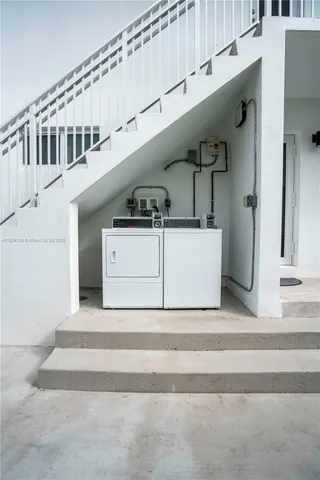 a front view of a house with a yard and porch
