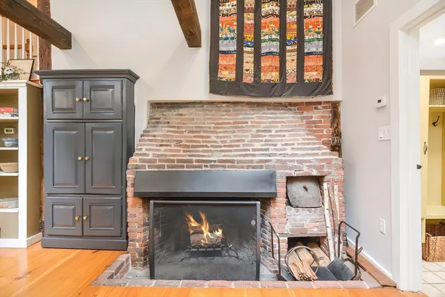 a view of living room with a fireplace