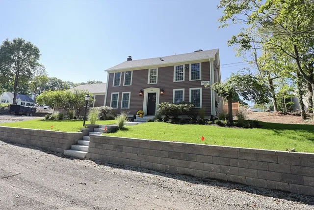a house view with a garden space