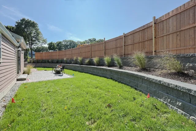 a view of a backyard with a garden