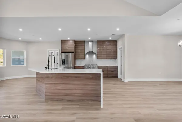 a view of kitchen with wooden floor