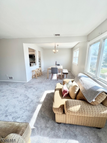 341 Trotting Road Union, NJ 07083 - Photo 19 of 24 a bedroom with furniture and a flat screen tv