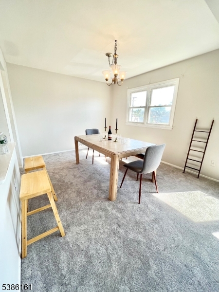 341 Trotting Road Union, NJ 07083 - Photo 22 of 24 a view of a workspace with furniture and a window