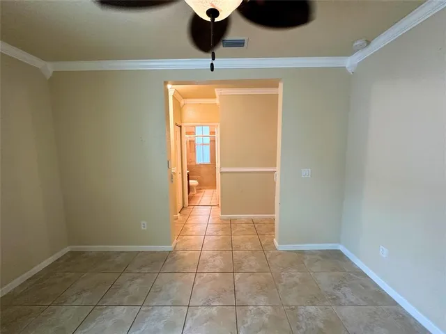 a bathroom with a sink a toilet a mirror and shower