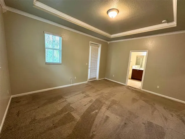 a room with a mirror and vanity