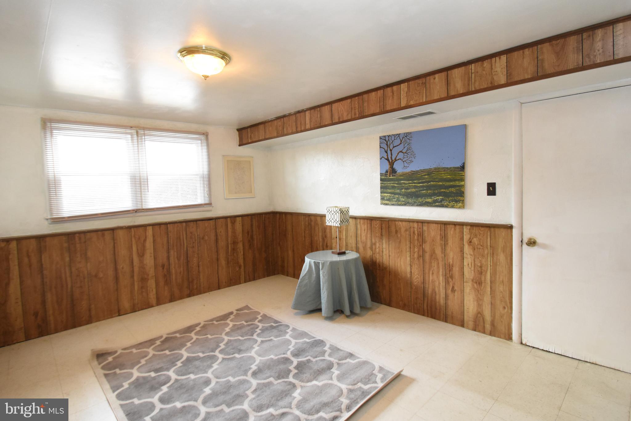 605 Arlewood Road Baltimore, MD 21228 - Photo 15 of 24 Family Room off garage-perfect for in home office