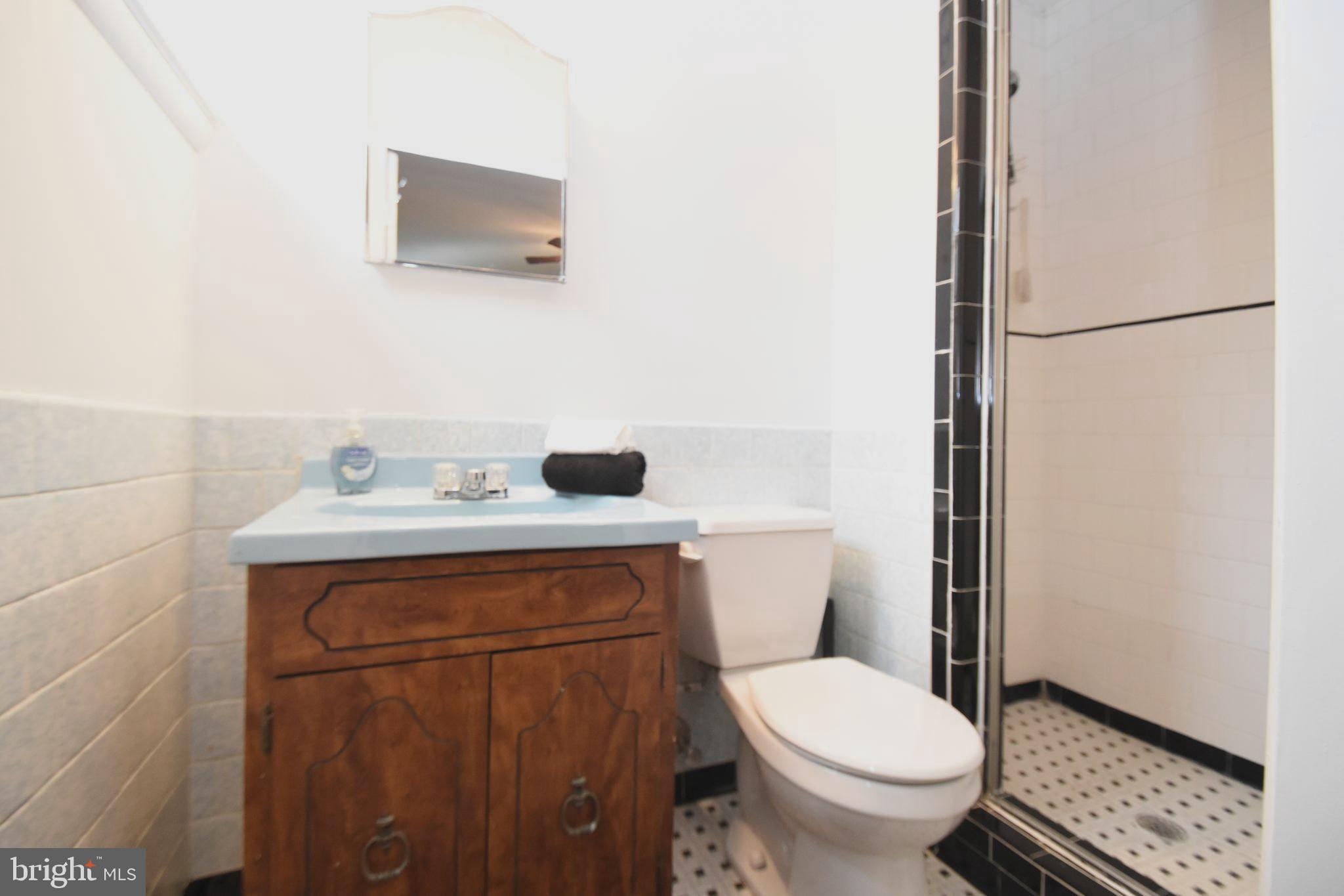605 Arlewood Road Baltimore, MD 21228 - Photo 19 of 24 Subway Tile in MBR bath