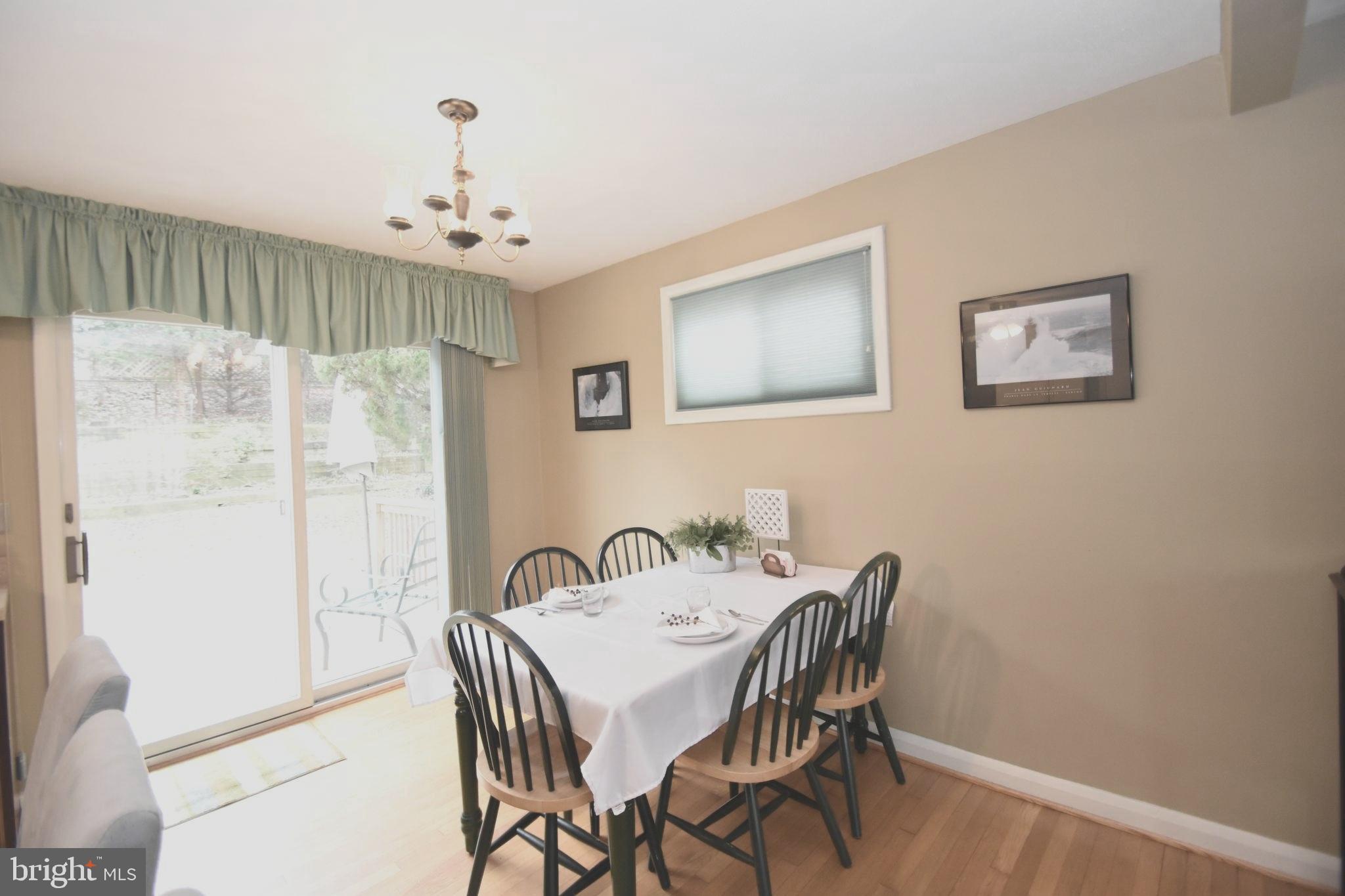 605 Arlewood Road Baltimore, MD 21228 - Photo 7 of 24 Slider to deck off Dining area