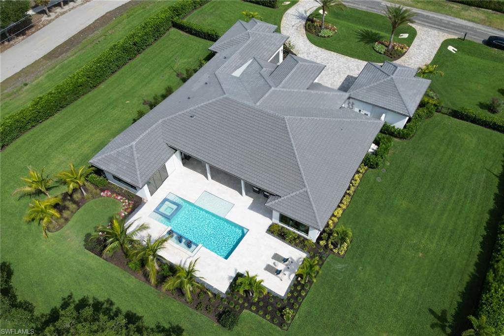 12 Banyan Road Naples, FL 34108 - Photo 43 of 44 an aerial view of a house with a garden