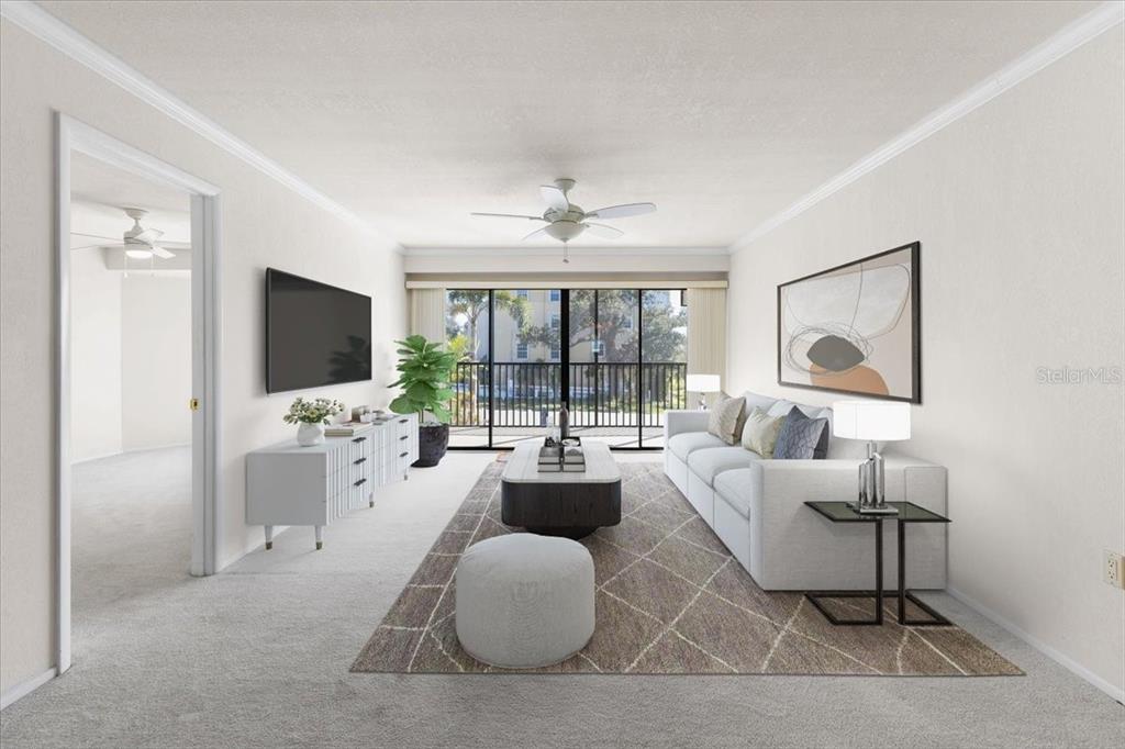 53 West Bay Heights Road, Unit 205 Englewood, FL 34223 - Photo 7 of 43 a living room with furniture and a flat screen tv