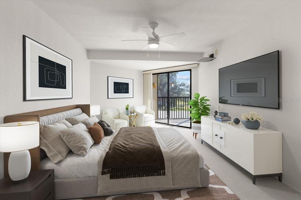 53 West Bay Heights Road, Unit 205 Englewood, FL 34223 - Photo 8 of 43 a living room with furniture and a flat screen tv