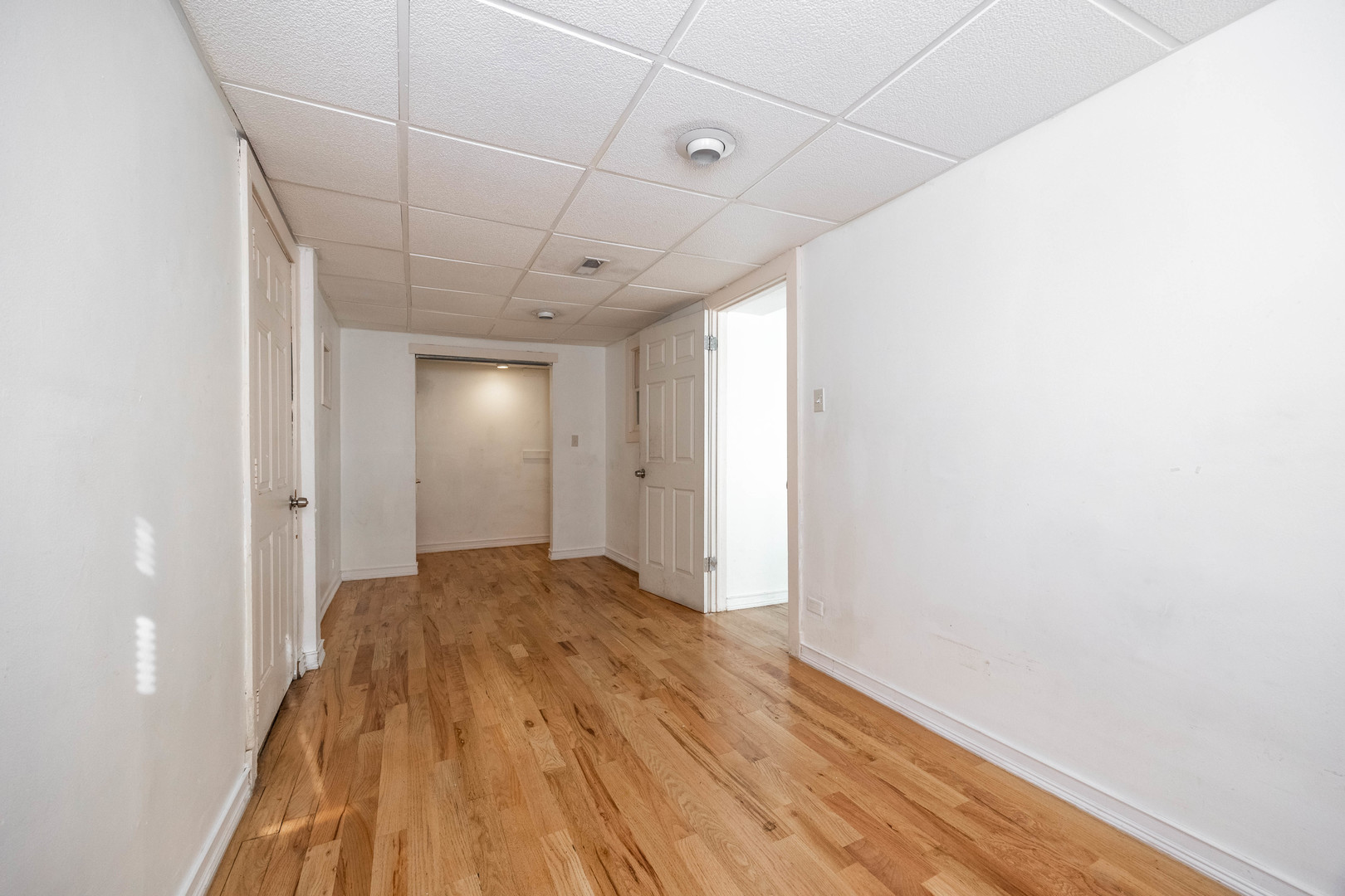 3248 West 25th Street, Unit 2 Chicago, IL 60623 - Photo 13 of 17 a view of a livingroom with wooden floor