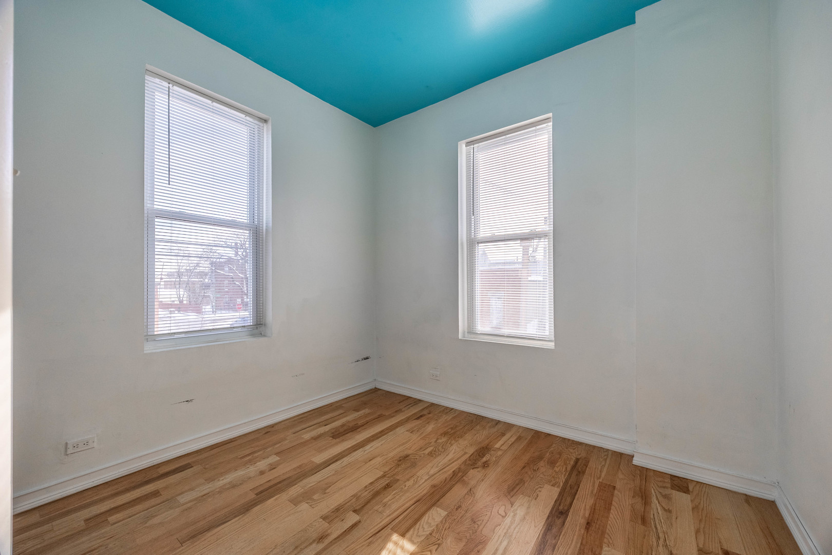 3248 West 25th Street, Unit 2 Chicago, IL 60623 - Photo 14 of 17 an empty room with a window