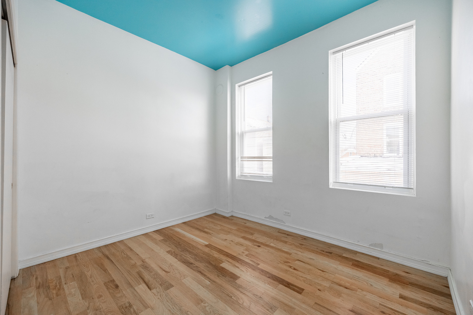 3248 West 25th Street, Unit 2 Chicago, IL 60623 - Photo 16 of 17 an empty room with a window