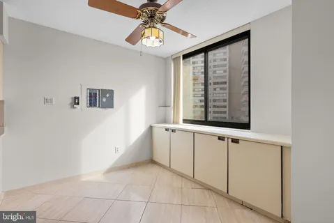 a view of a hallway with windows