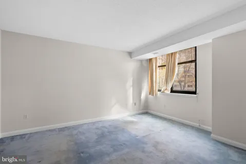 an empty room with windows