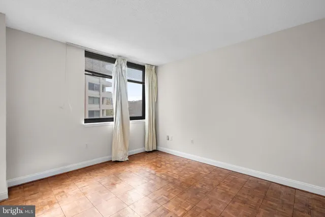 an empty room with windows