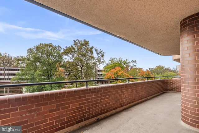 a view of balcony with furniture