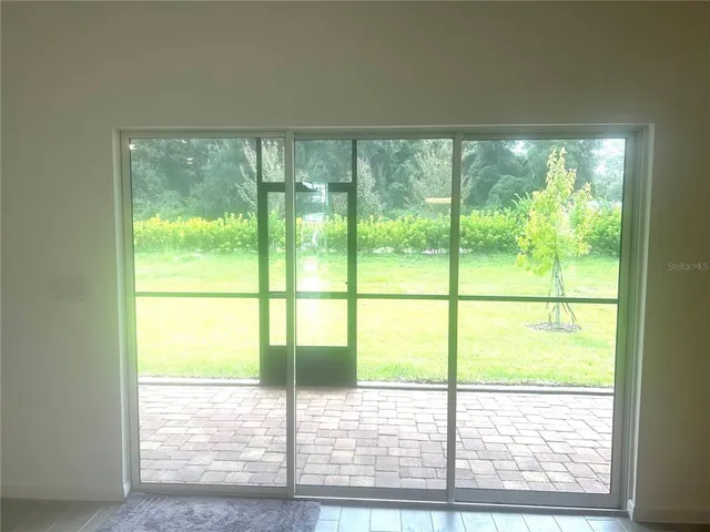 a view of a room that has a window