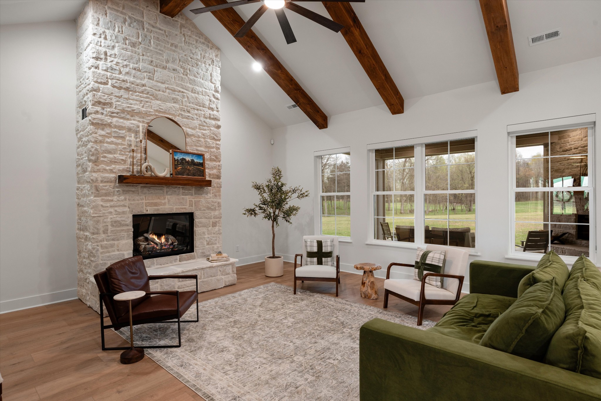 4057 Calista Road Cross Plains, TN 37049 - Photo 28 of 92 a living room with furniture and a fireplace