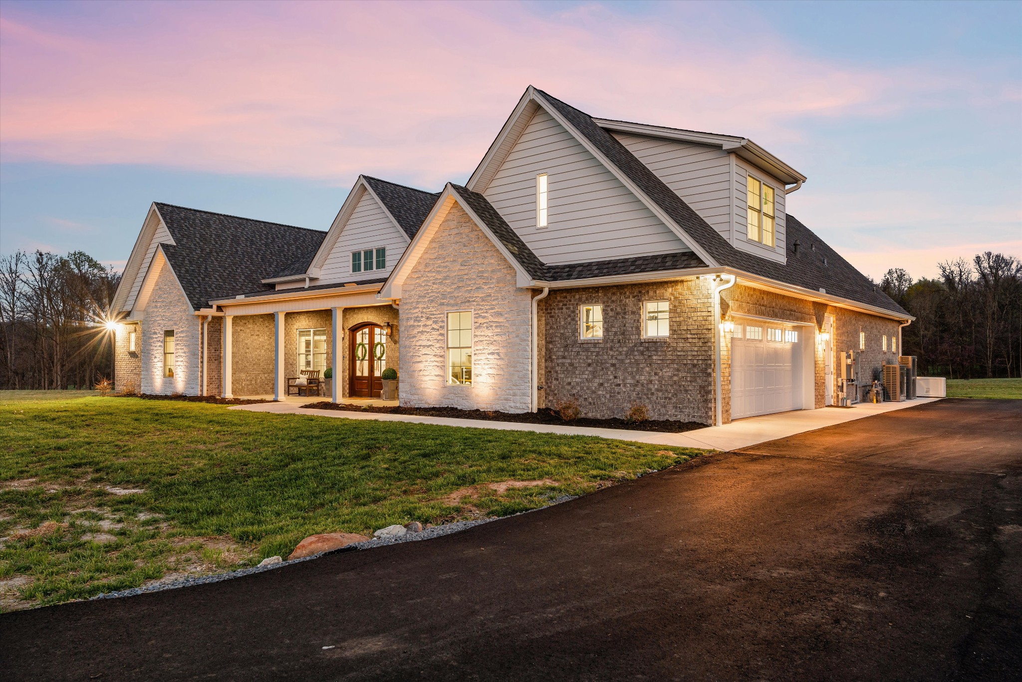 4057 Calista Road Cross Plains, TN 37049 - Photo 3 of 92 a front view of a house with a garden