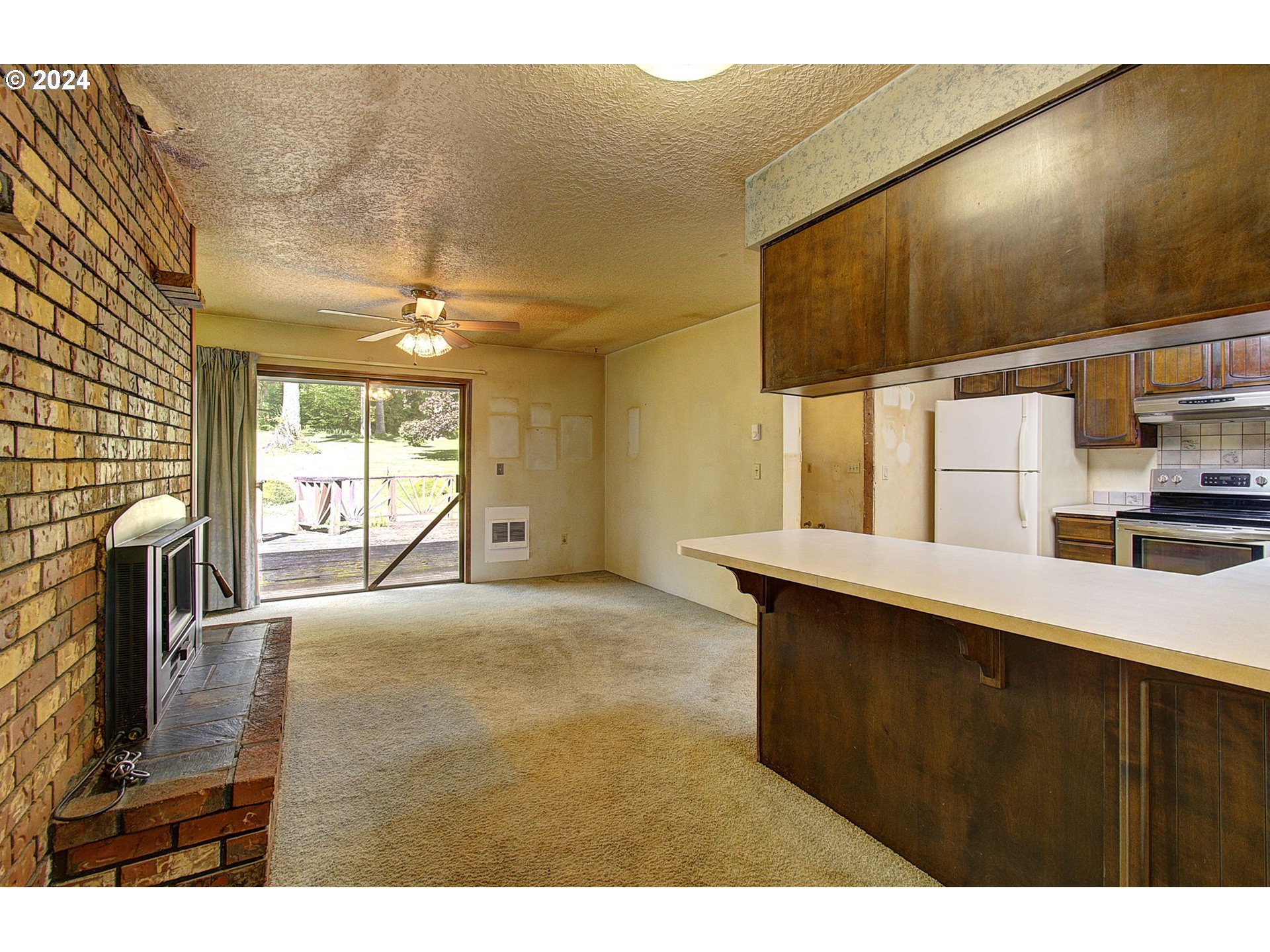 111 Backstrom Road Winlock, WA 98596 - Photo 25 of 30 a view of a kitchen with a sink and a large window