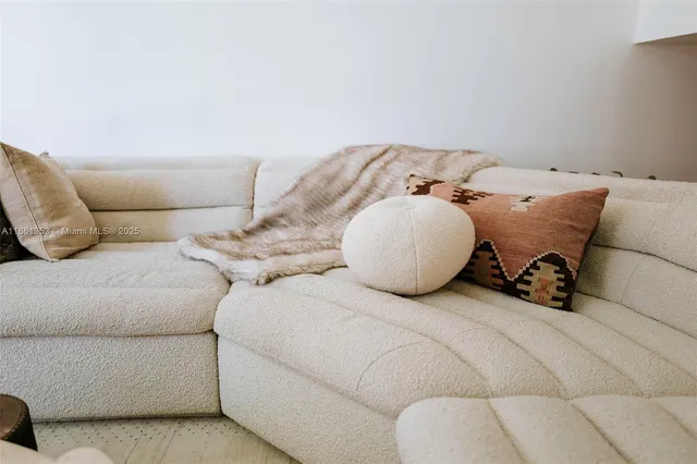 a room with a table and chairs