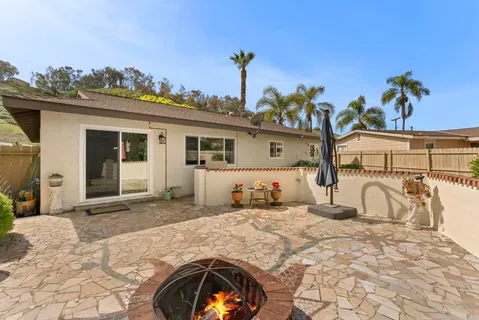 a front view of a house with a porch