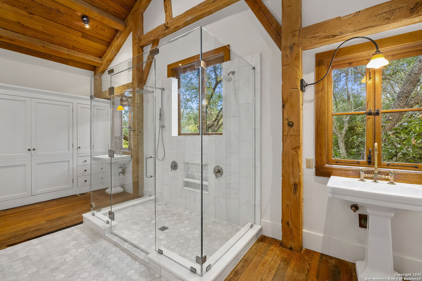 317 Limestone Crk Road Hill Country Village, TX 78232 - Photo 21 of 51 a bathroom with a shower and a sink