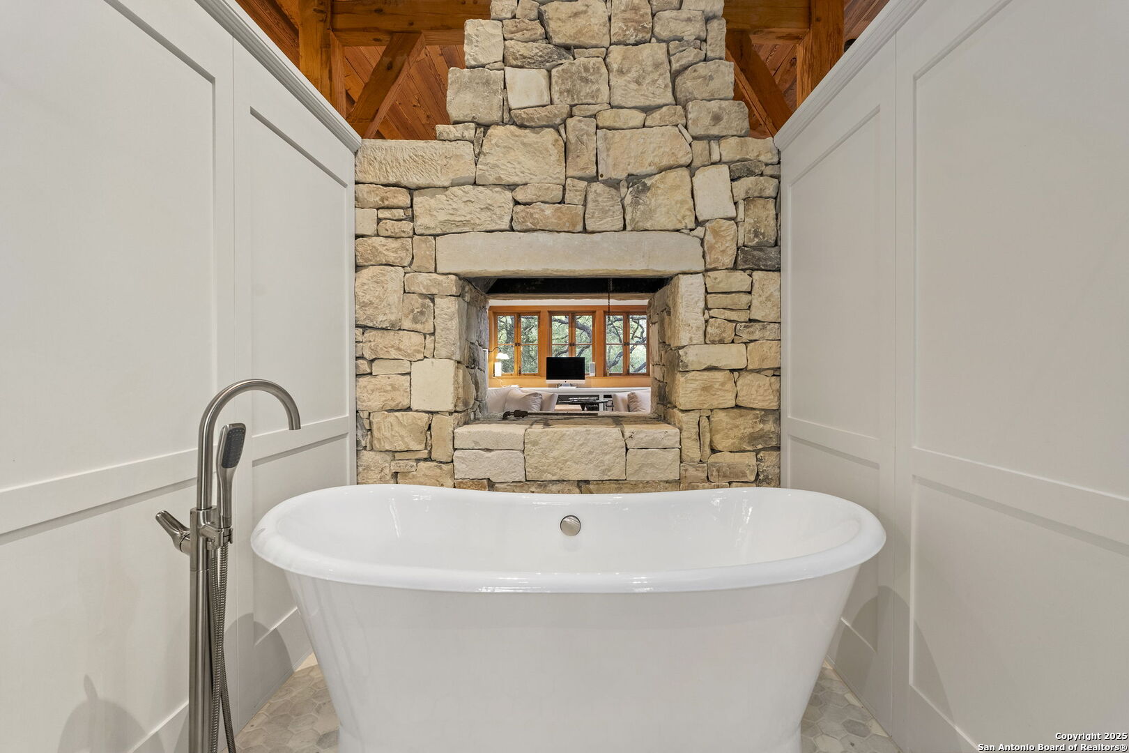 317 Limestone Crk Road Hill Country Village, TX 78232 - Photo 24 of 51 a bathroom with a sink and a mirror