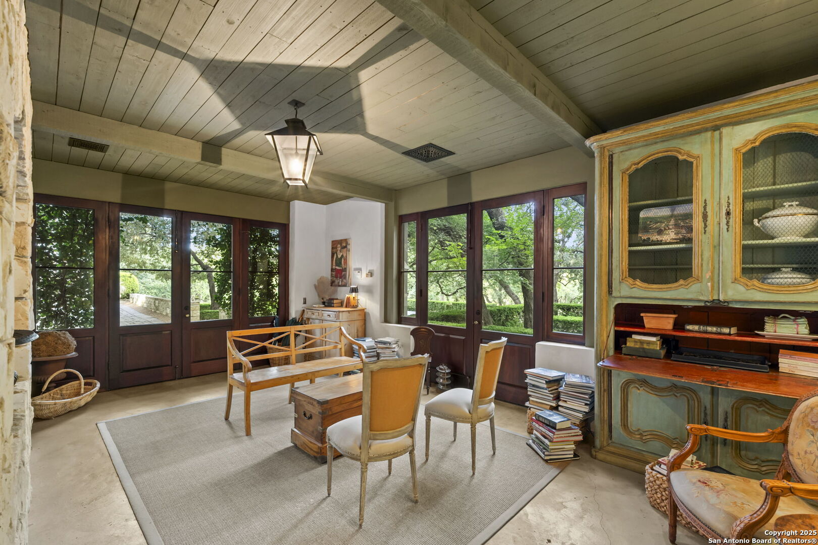 317 Limestone Crk Road Hill Country Village, TX 78232 - Photo 27 of 51 a outdoor space with lots of furniture and large windows