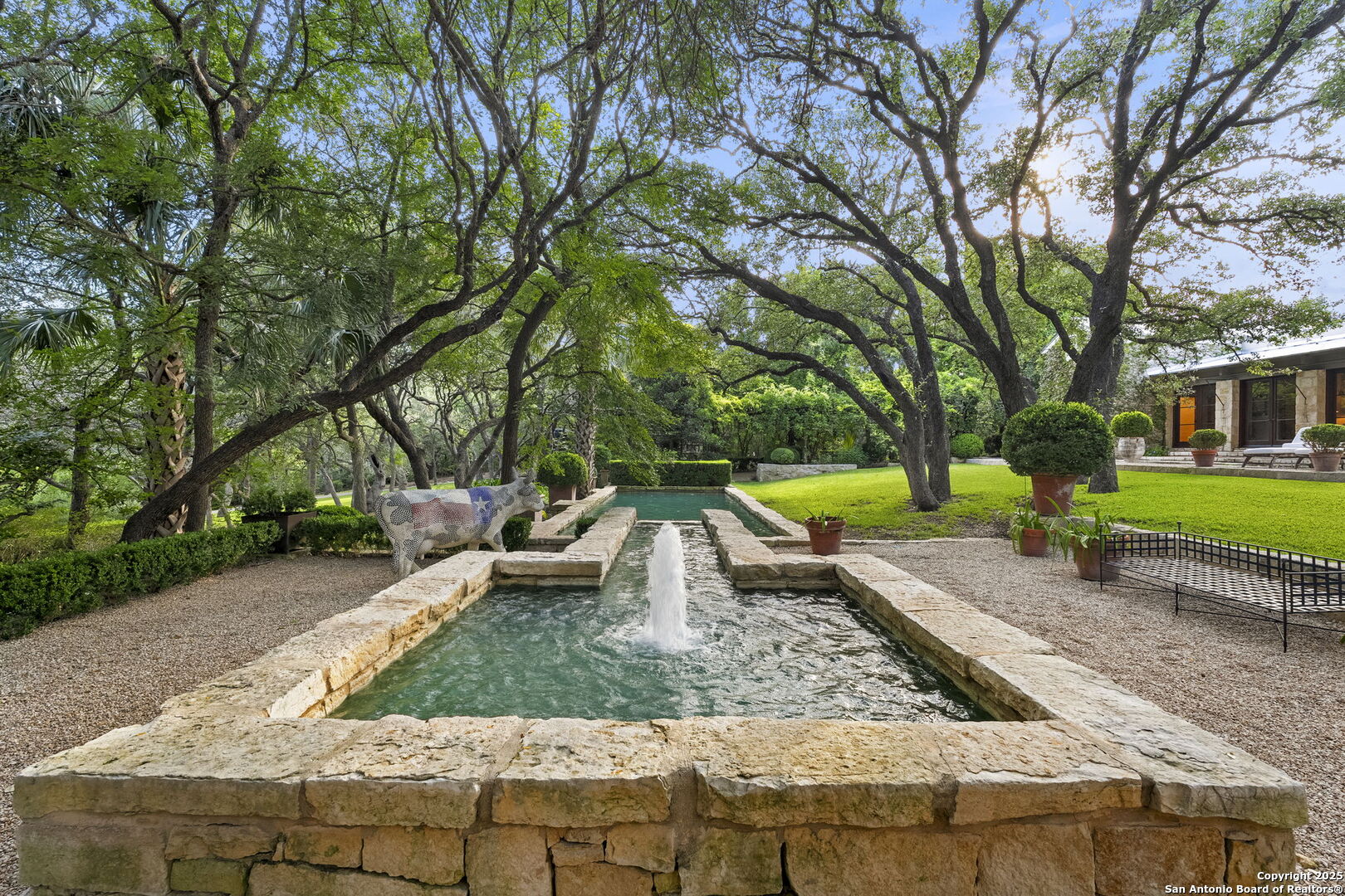 317 Limestone Crk Road Hill Country Village, TX 78232 - Photo 45 of 51 a view of a backyard with a garden