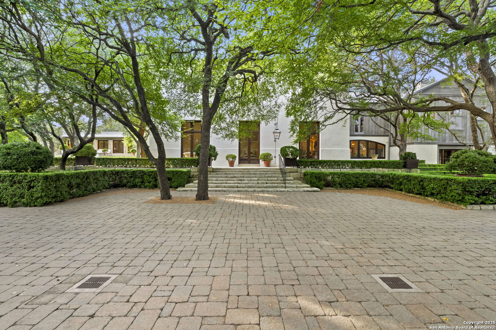 317 Limestone Crk Road Hill Country Village, TX 78232 - Photo 46 of 51 a front view of a house with garden