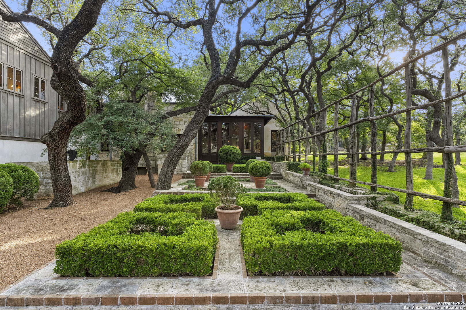 317 Limestone Crk Road Hill Country Village, TX 78232 - Photo 48 of 51 a front view of a house with garden