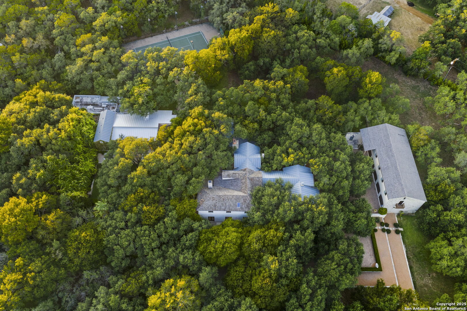 317 Limestone Crk Road Hill Country Village, TX 78232 - Photo 51 of 51 an aerial view of a house with a yard basket ball court and outdoor seating