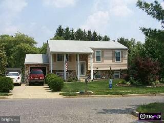 6 Old Farm Road Sicklerville, NJ 08081 - Photo 1 of 1 a front view of a house with a yard and potted plants