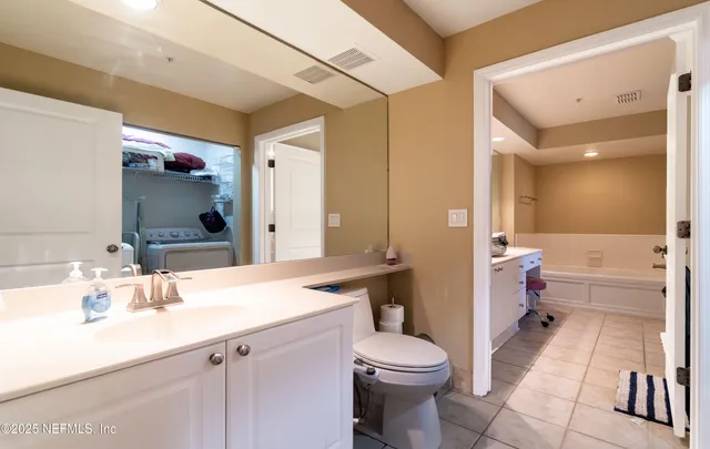 a view of a livingroom with furniture and windows