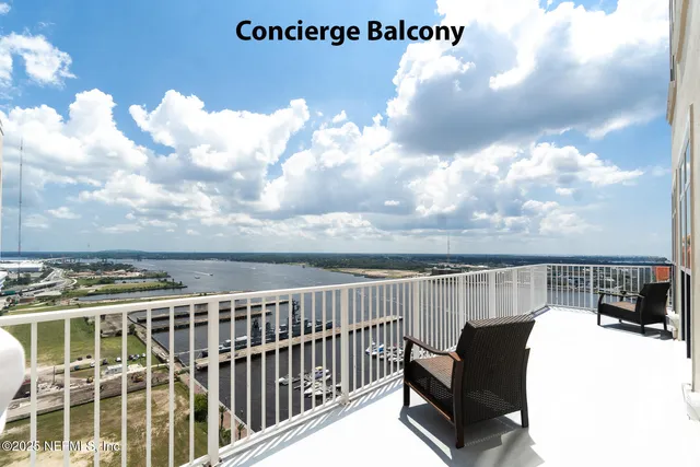 a view of kitchen with wooden floor
